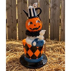 New with tag. GHOULISH figurine, jack o lantern w/ small ghosts in a top hat